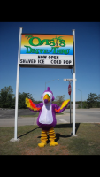 The Oasis Grill Sign and Mascot